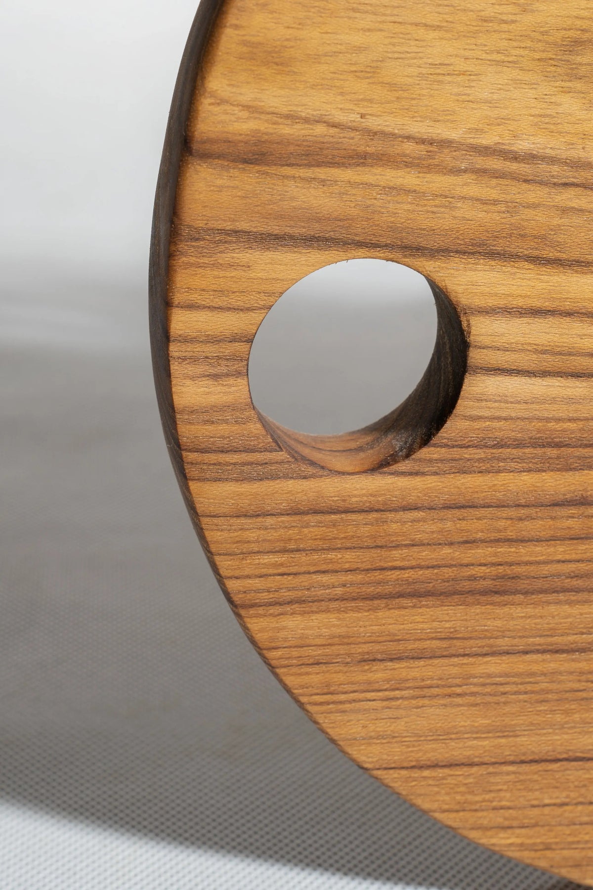 Round teak board with cut-outs – view 6